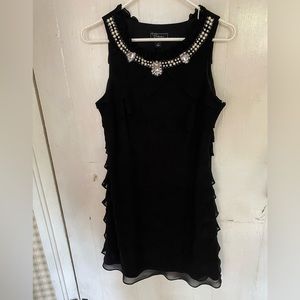 Chiffon ruffle embellished cocktail dress.
